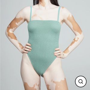 You swim one piece. Worn twice. Hand washed. Like new condition